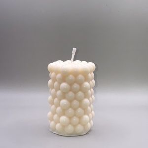 White cylinder bubble candle